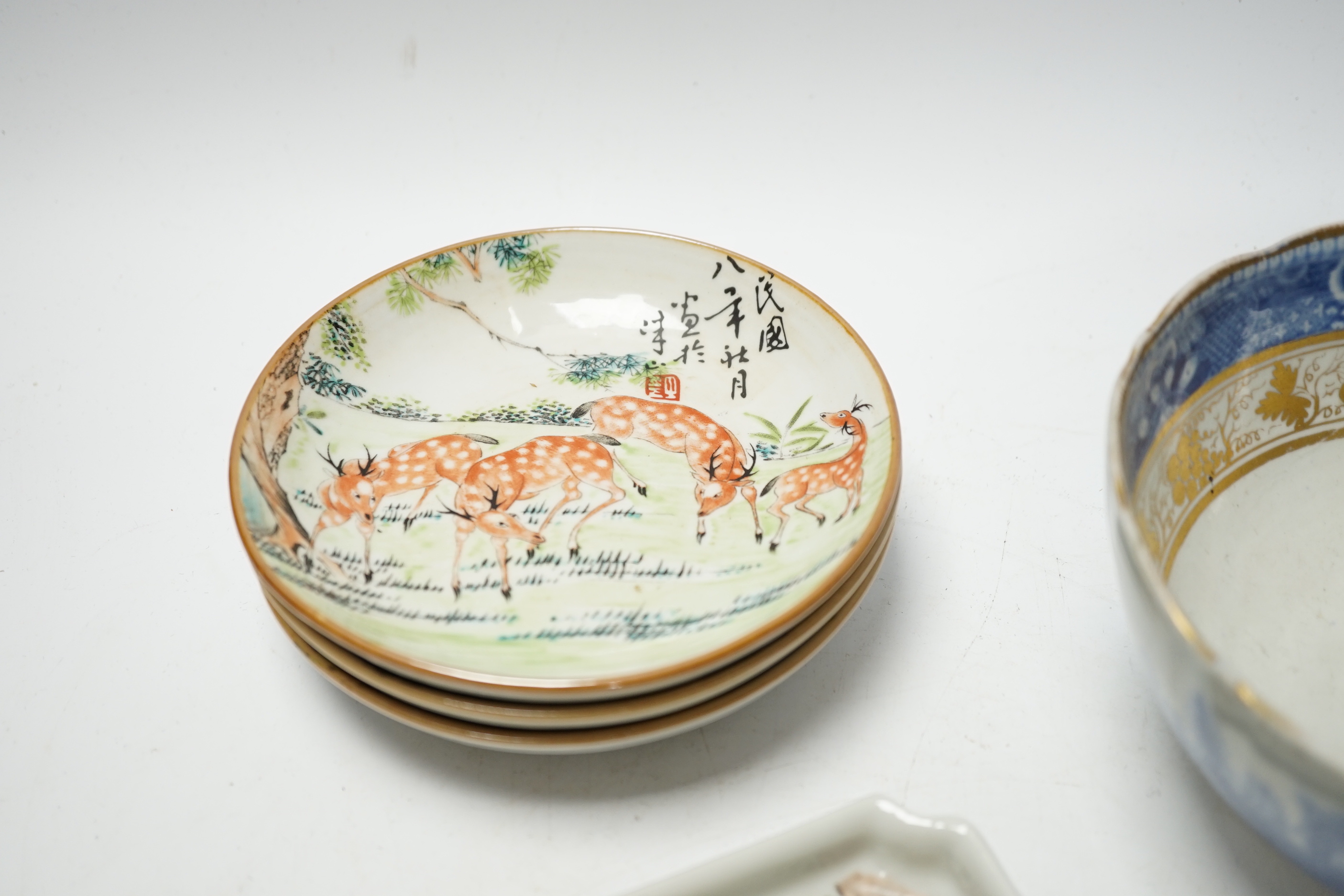 Five items of Chinese tableware; a rectangular tray, three shallow dishes, and a blue and white bowl with gilt decoration, bowl diameter, 14.5cm